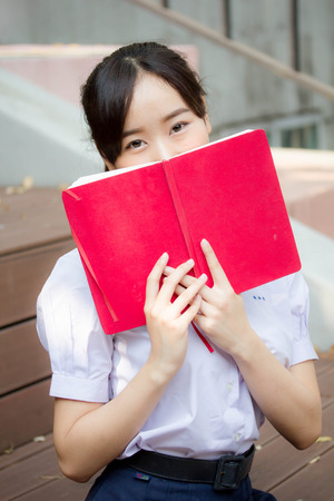 asia thai high school student uniform beautiful girl read a bookの写真素材