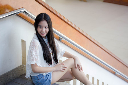 Portrait of thai teen beautiful girl happy and relax.の写真素材