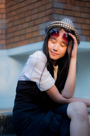 Portrait of thai teen beautiful girl happy and relax.の写真素材