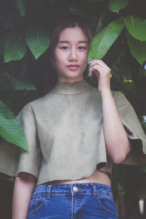 Portrait of thai china adult beautiful girl relax time, in Vintage Styleの写真素材