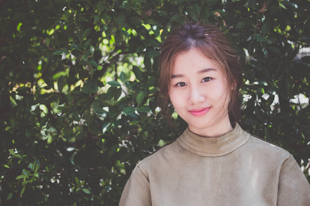 Portrait of thai china adult beautiful girl relax time, in Vintage Styleの写真素材