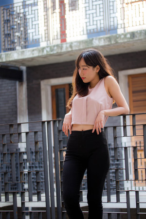 Portrait of thai china adult beautiful girl relax and smile