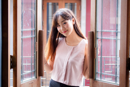 Portrait of thai china adult beautiful girl relax and smile