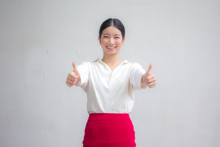 Portrait of thai adult working women white shirt red skirt Greatの写真素材