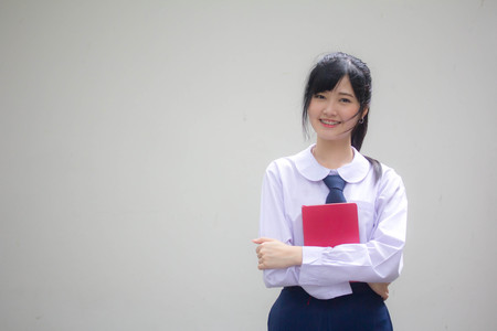 asia thai high school student uniform beautiful girl read a bookの写真素材