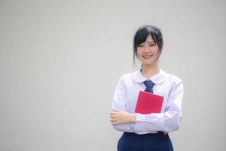 asia thai high school student uniform beautiful girl read a bookの写真素材