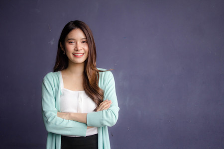 thai china adult office girl white shirt relax and smileの写真素材