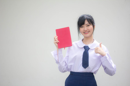 asia thai high school student uniform beautiful girl read a bookの写真素材