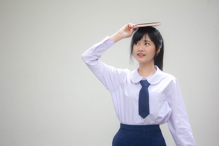 asia thai high school student uniform beautiful girl read a bookの写真素材