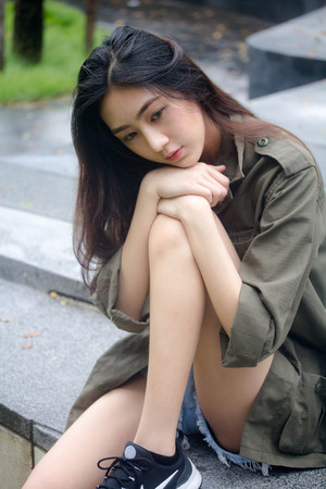 Portrait of thai adult beautiful girl relax and smileの写真素材