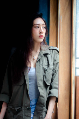 Portrait of thai adult beautiful girl relax and smile