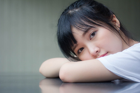 asia thai japanese teen teen White t-shirt beautiful girl happy and relaxの写真素材