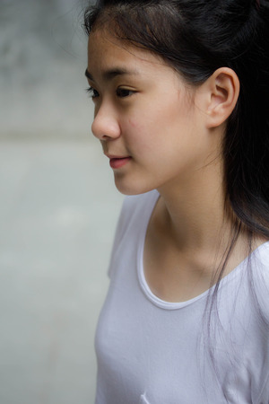 asia thai teen White t-shirt beautiful girl happy and relaxの写真素材