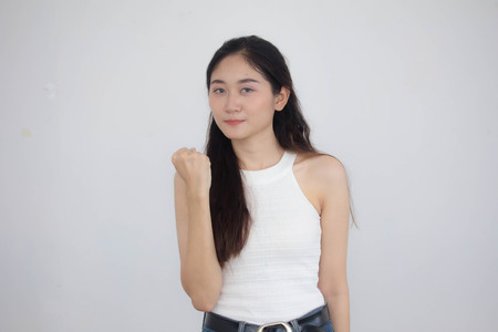 Portrait of thai china adult beautiful girl White shirt blue jeans excellentの写真素材