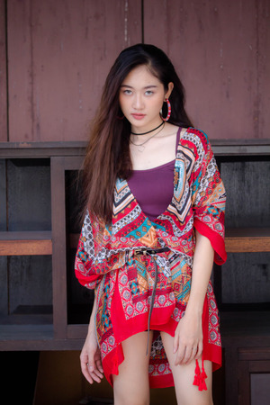Portrait of thai china adult bohemian girl relax and smileの写真素材