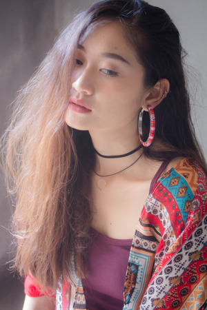 Portrait of thai china adult bohemian girl relax and smileの写真素材