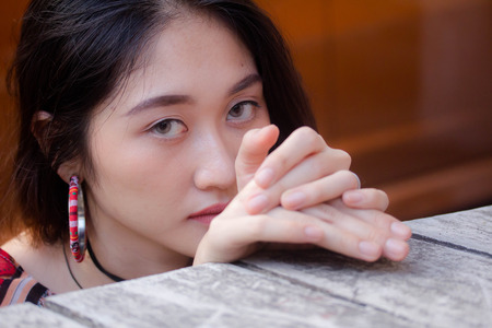 Portrait of thai china adult bohemian girl relax and smileの写真素材