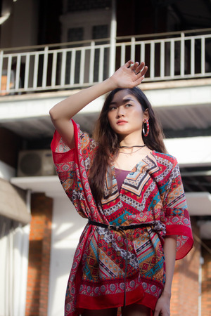 Portrait of thai china adult bohemian girl relax and smileの写真素材