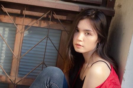 asia thai teen red coat on street fashionの写真素材