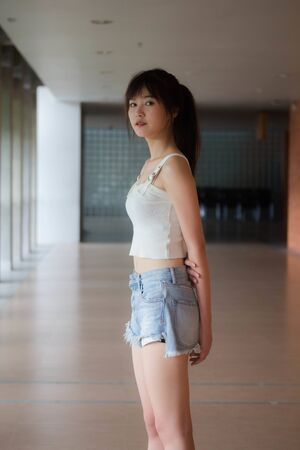 asia thai japanese teen White t-shirt beautiful girl happy and relaxの写真素材