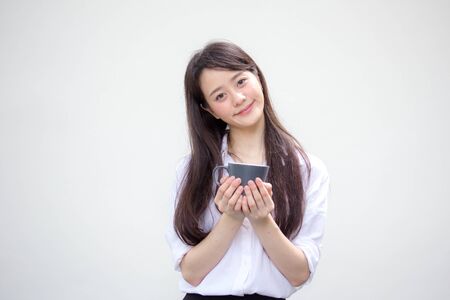 portrait of thai china adult office girl white shirt drinking coffeeの写真素材