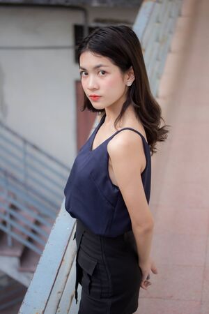 Portrait of thai adult beautiful girl relax and smileの写真素材