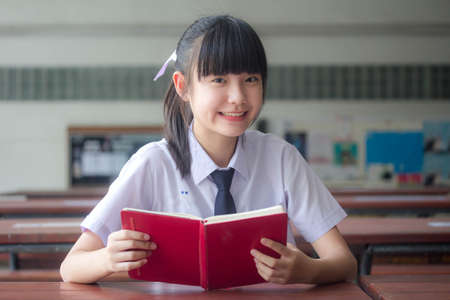 thai Junior high school student uniform teen beautiful girl happy and relaxの写真素材