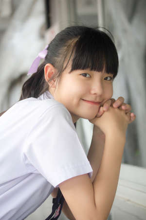 thai Junior high school student uniform teen beautiful girl happy and relax