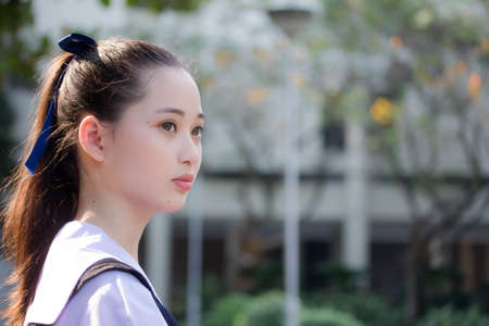 asia thai Junior high school student uniform beautiful girl smile and relaxの写真素材