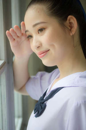 asia thai Junior high school student uniform beautiful girl smile and relaxの写真素材