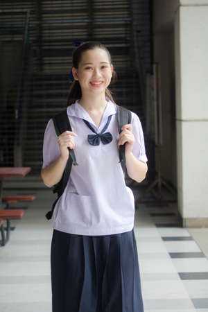 asia thai Junior high school student uniform beautiful girl smile and relax