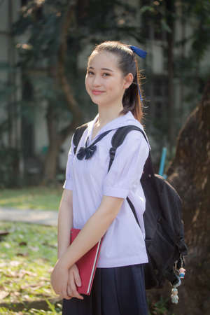 asia thai Junior high school student uniform beautiful girl smile and relax