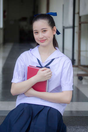 asia thai Junior high school student uniform beautiful girl smile and relaxの写真素材