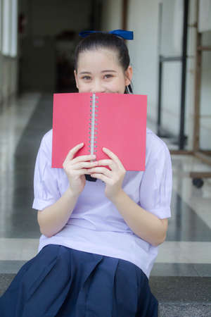 asia thai Junior high school student uniform beautiful girl smile and relaxの写真素材