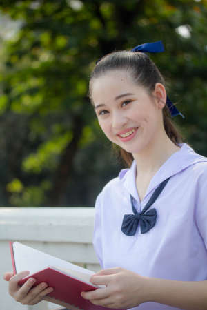asia thai Junior high school student uniform beautiful girl smile and relaxの写真素材
