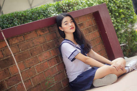 japanese teen beautiful girl in student uniform happy and relax