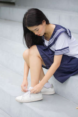japanese teen beautiful girl in student uniform happy and relax