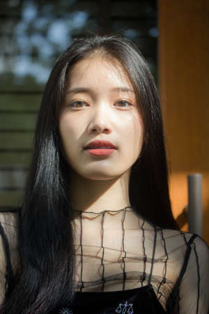 asia thai teen black dress beautiful girl smile and relax