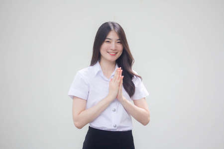 thai adult student university uniform beautiful girl thai Pay respectの写真素材