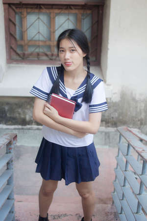 japanese teen beautiful girl in student uniform happy and relax