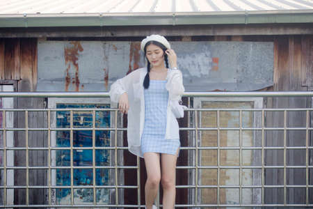 asia thai teen blue dress beautiful girl smile and relax