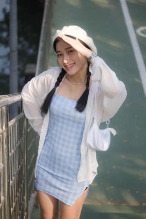 asia thai teen blue dress beautiful girl smile and relax