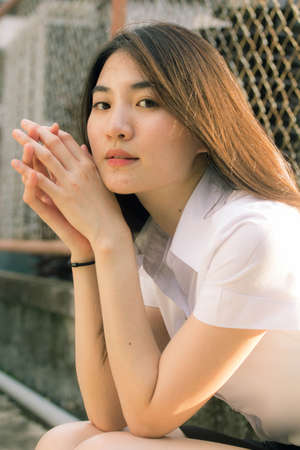 thai adult student university uniform beautiful girl smile and relax