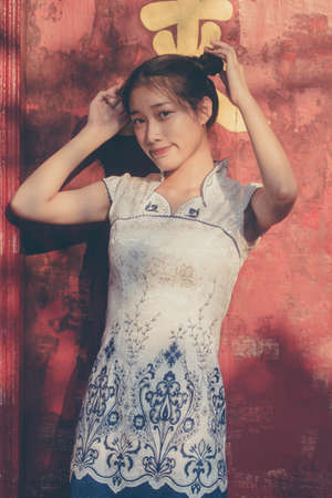 asia thai teen White dress beautiful girl smile and relaxの写真素材