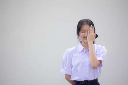 Portrait of thai high school student uniform beautiful girl not lookの写真素材