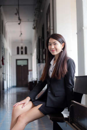 portrait of thai adult office girl smile and relaxの写真素材