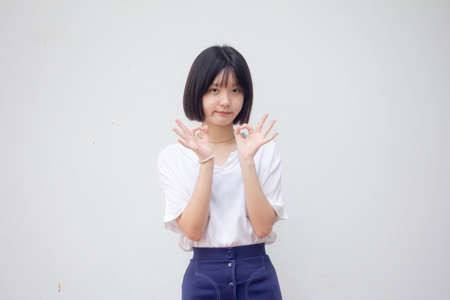 asia thai teen White t-shirt beautiful girl OKの写真素材