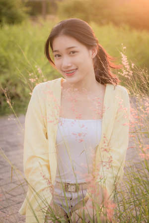 asia thai teen yellow t-shirt beautiful girl smile and relax