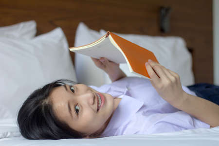 asia thai high school student uniform beautiful girl read a bookの写真素材