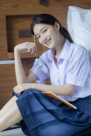 asia thai high school student uniform beautiful girl smile and relax